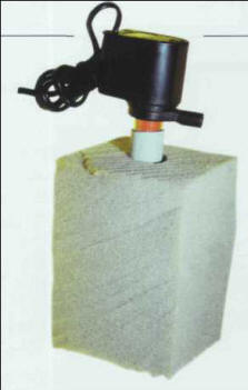 A pump, a PVC pipe with slits down the sides, and a block of foam make up a filter that can be quickly put into operation.
